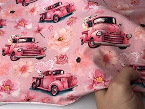 Bomuldsjersey - fine biler med blomster og på lyserød bund